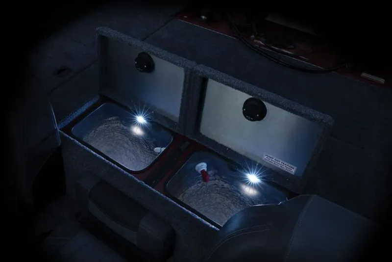 Slide: The Image of 2024 Tracker Pro Team™ 195 TXW Tournament Edition livewell compartments with LED lighting. - 2