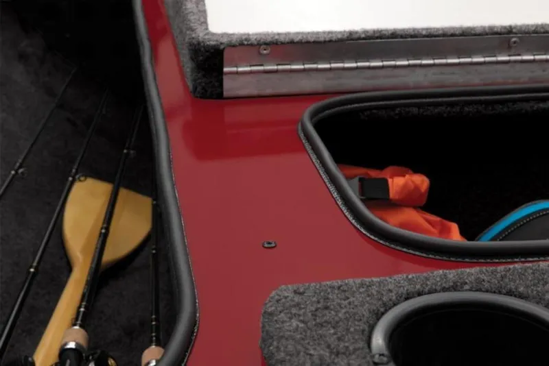 Slide: The Image of 2024 Tracker Pro Team™ 195 TXW Tournament Edition boat interior with storage compartments. - 21