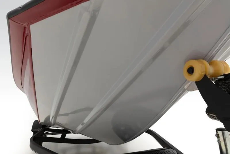 Slide: The Image of 2024 Tracker Pro Team™ 195 TXW Tournament Edition boat hull on trailer. - 27