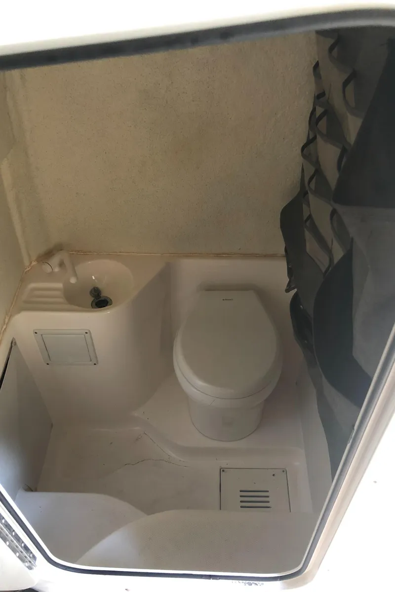 Slide: The Image of Compact marine bathroom in 2016 Wellcraft 30 Scarab Offshore Tournament boat. - 14