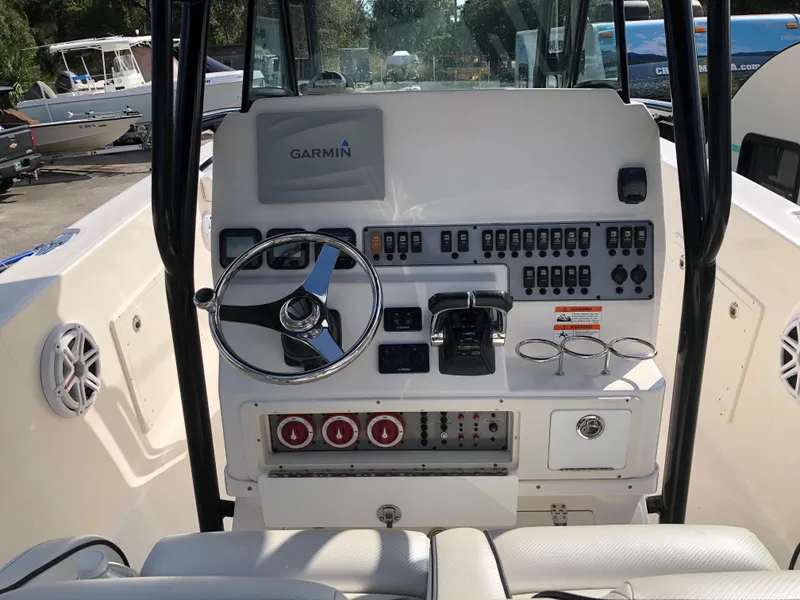 Slide: The Image of 2016 Wellcraft 30 Scarab Offshore Tournament boat dashboard with Garmin navigation system. - 4