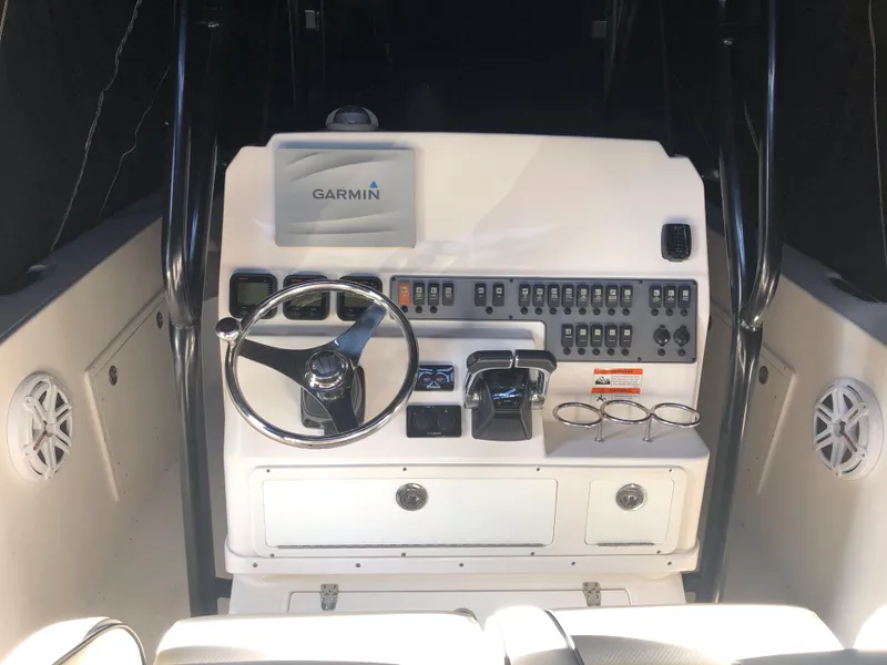 Slide: The Image of 2016 Wellcraft 30 Scarab Offshore Tournament boat console with Garmin navigation. - 5