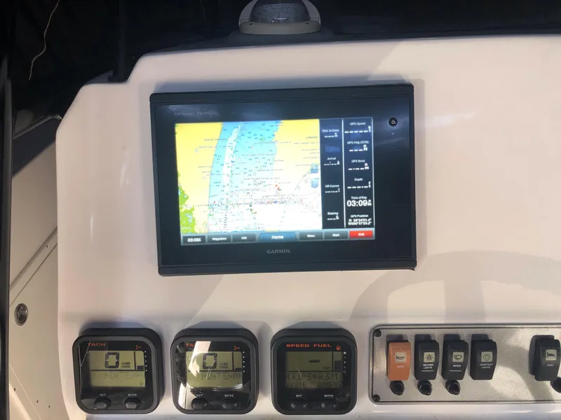 Slide: The Image of Dashboard of a 2016 Wellcraft 30 Scarab Offshore Tournament boat with navigation system. - 6