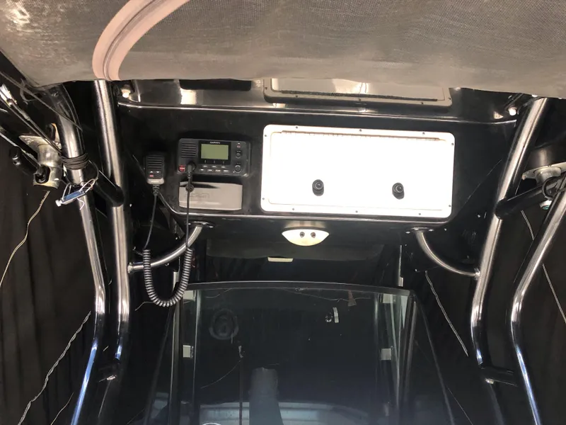 Slide: The Image of 2016 Wellcraft 30 Scarab Offshore Tournament boat interior console. - 8