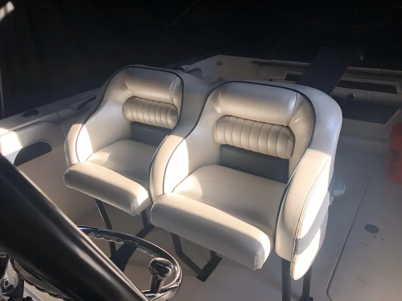 Slide: The Image of 2016 Wellcraft 30 Scarab Offshore Tournament boat seats in white. - 9