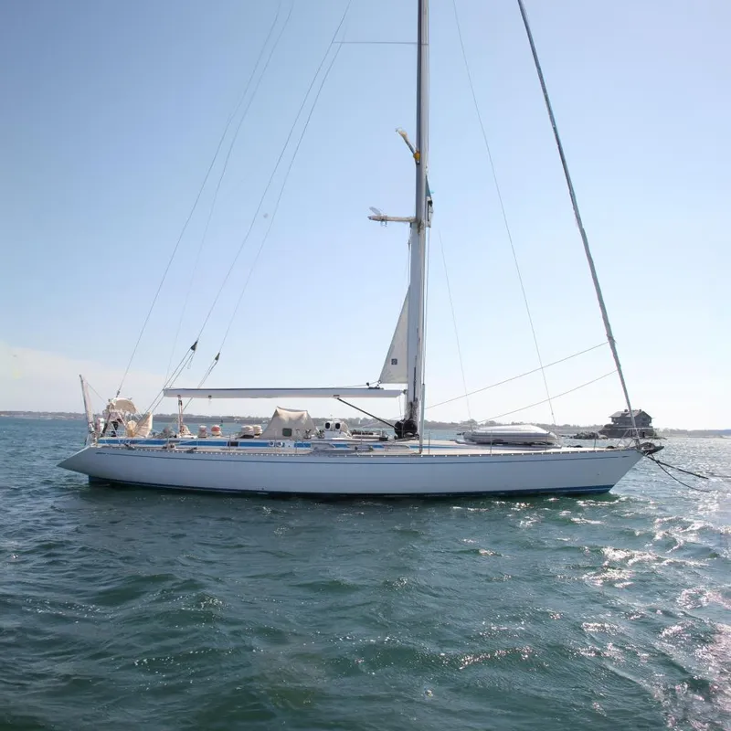 The Image of Sailing yacht Nautor Swan 651, 1989 model, on open water under clear skies. - 0