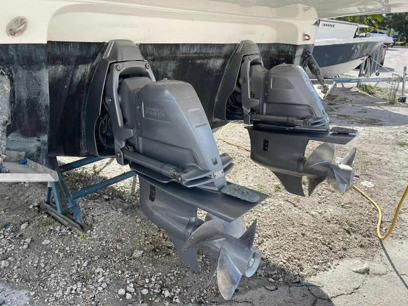 Slide: The Image of 2014 Monterey 320 Sport Yacht dual outboard motors on dry dock. - 29
