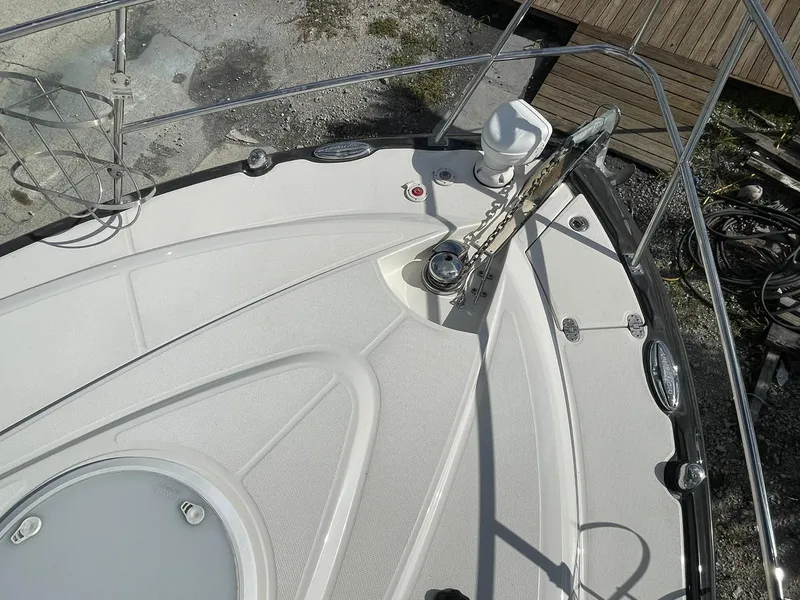 Slide: The Image of 2014 Monterey 320 Sport Yacht bow deck with anchor and railing. - 30