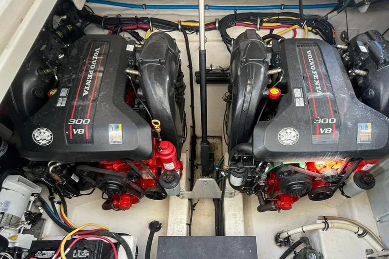 Slide: The Image of 2014 Monterey 320 Sport Yacht engine compartment with twin Volvo Penta 300 V8 engines. - 32