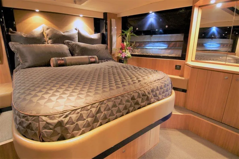Slide: The Image of Luxurious bedroom interior of 2004 Riva Splendida yacht with elegant bedding and ambient lighting. - 13