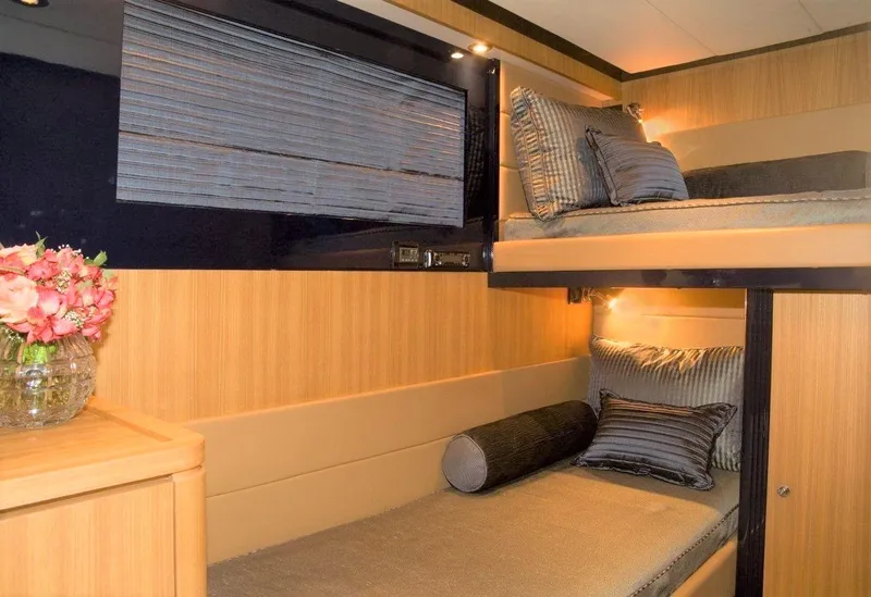 Slide: The Image of Interior cabin of 2004 Riva Splendida yacht with bunk beds and elegant decor. - 16