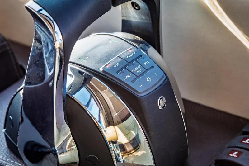 Slide: The Image of Control panel of a 2015 Regal 53 Sport Coupe yacht, featuring various operational buttons. - 27