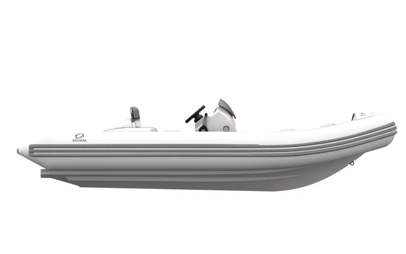 Slide: The Image of 2025 Zodiac Yachtline 490 inflatable boat, side view, sleek white design. - 6