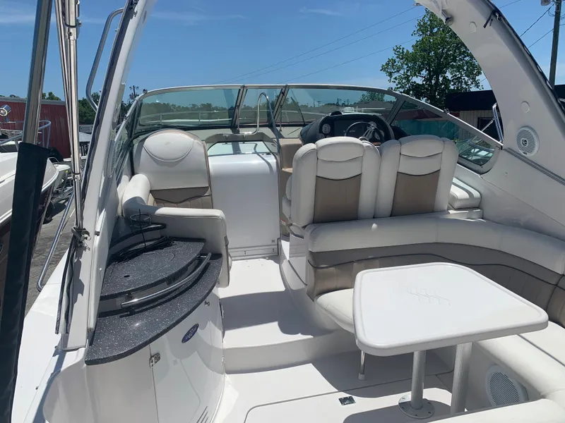 Slide: The Image of 2007 Four Winns 318 Vista boat interior with seating and helm. - 5