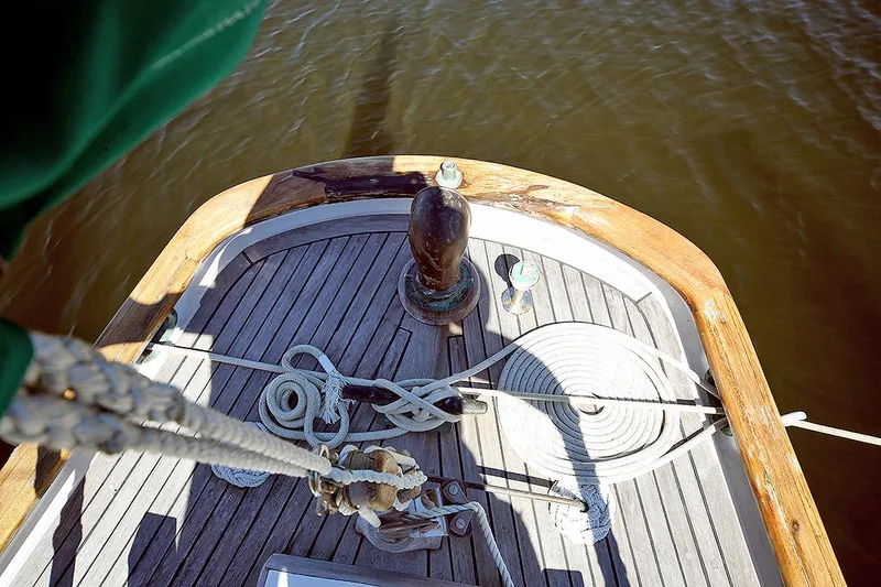 Slide: The Image of Deck of 1979 Custom Van Dyne Schooner with ropes and wooden details. - 19