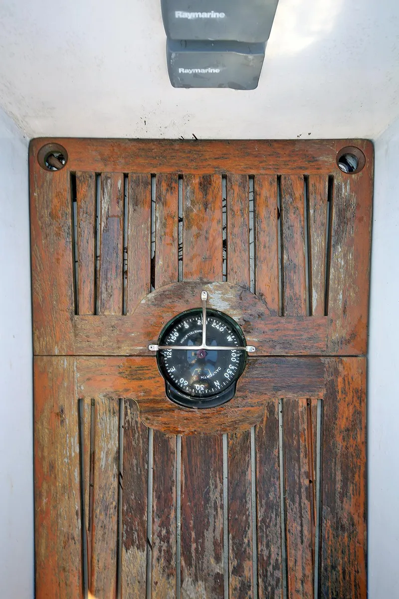 Slide: The Image of Vintage 1979 Custom Van Dyne Schooner with wooden hatch and compass. - 25