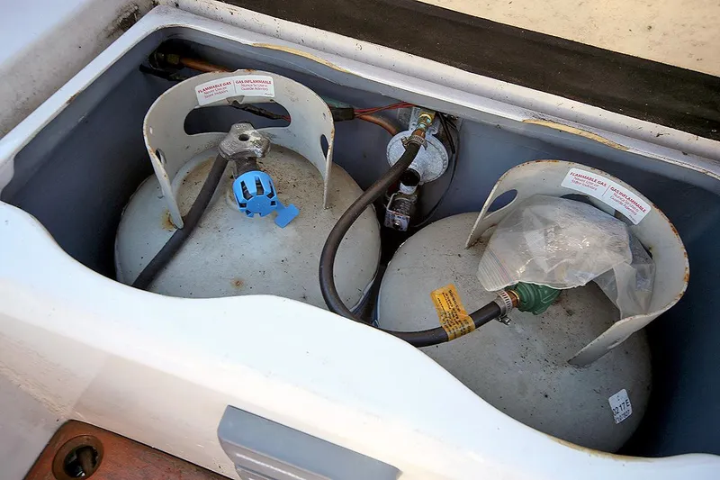 Slide: The Image of Propane tanks in storage compartment of 1979 Custom Van Dyne Schooner. - 28