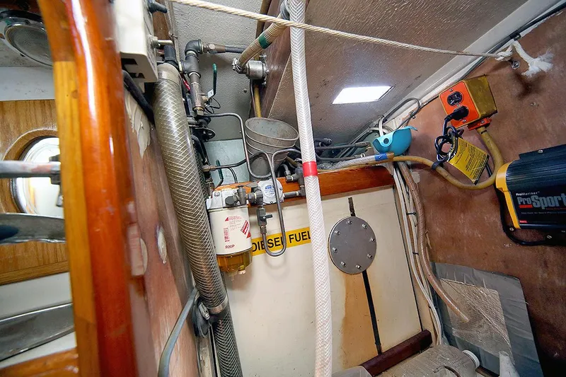 Slide: The Image of Engine room of a 1979 Custom Van Dyne Schooner with diesel fuel system. - 34