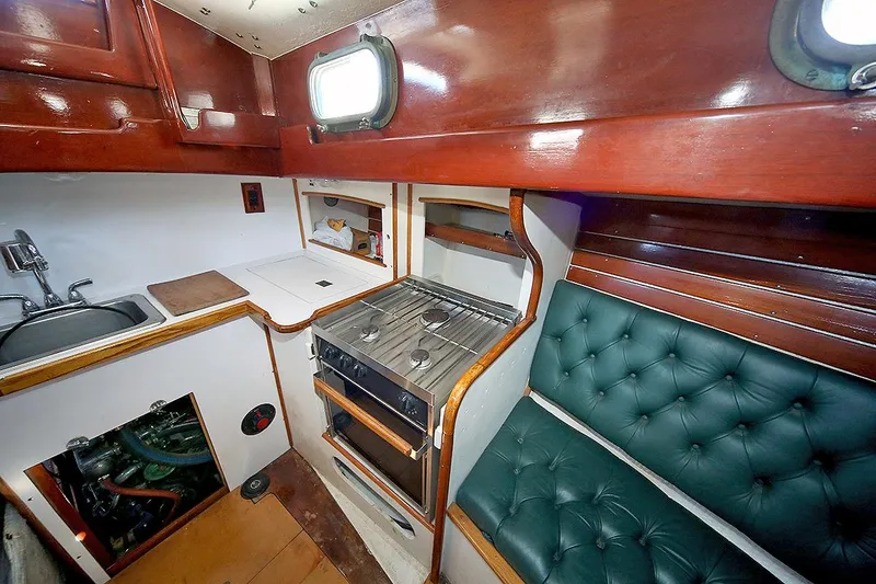 Slide: The Image of 1979 Custom Van Dyne Schooner interior with kitchen and seating area - 40