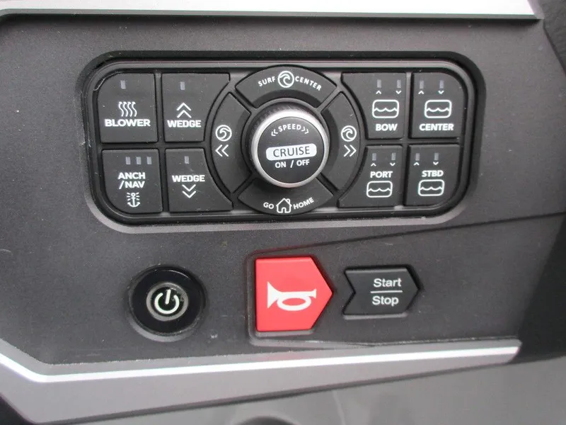 Slide: The Image of Control panel of a 2022 Axis A24 boat with various function buttons. - 11