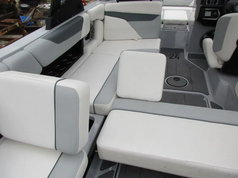 Slide: The Image of 2022 Axis A24 boat interior with white and gray seating arrangement. - 6