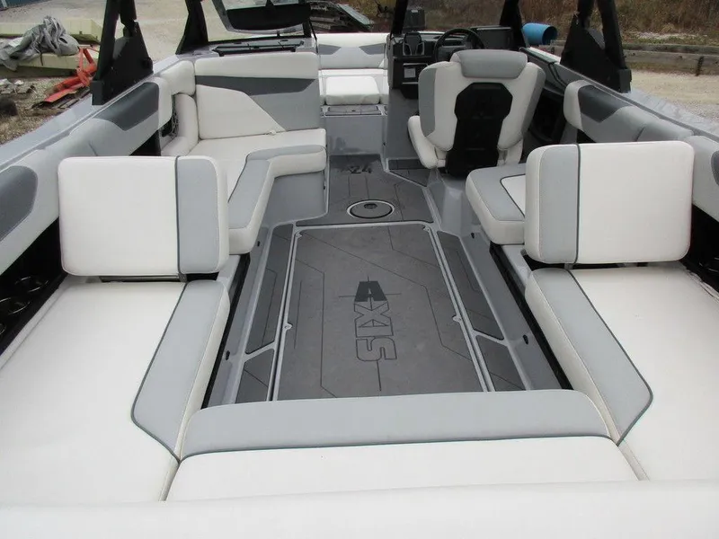 Slide: The Image of 2022 Axis A24 boat interior with spacious seating and modern design. - 8