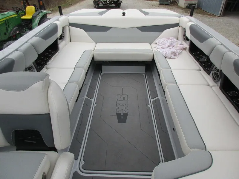 Slide: The Image of 2022 Axis A24 boat interior with spacious seating and modern design. - 9