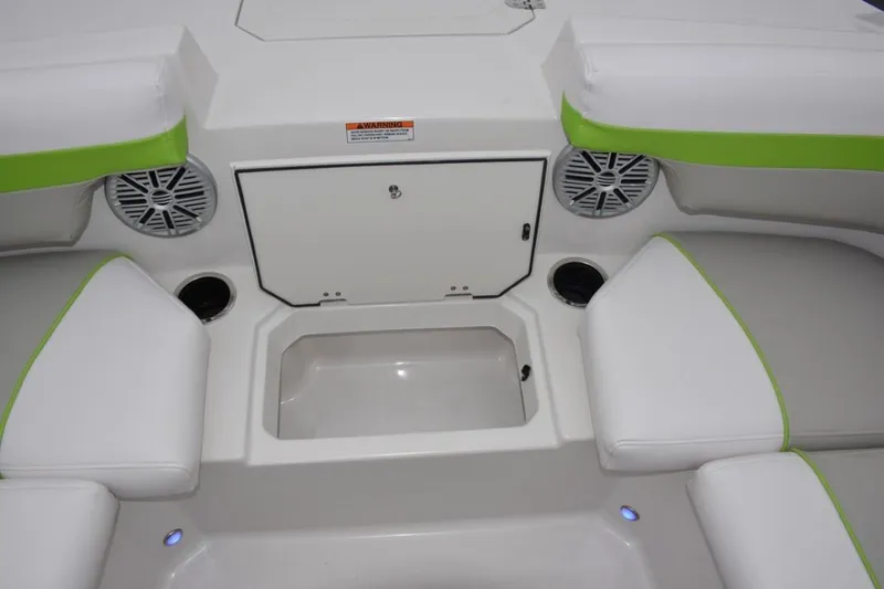 Slide: The Image of 2024 Starcraft 191 SVX boat interior with storage compartment and seating. - 9