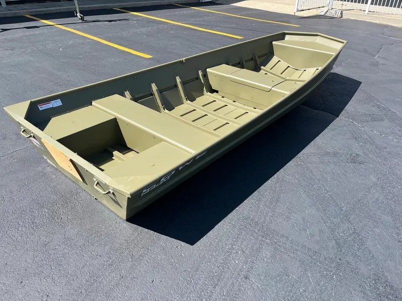 Slide: The Image of 2024 Lowe L1440M aluminum jon boat on pavement. - 4