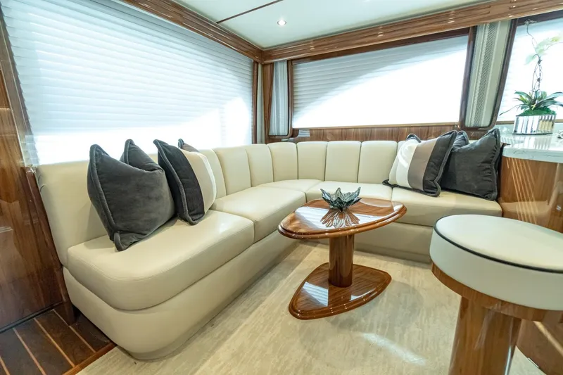 Slide: The Image of Luxurious interior of 2025 Viking 54 yacht with plush seating and elegant decor. - 12
