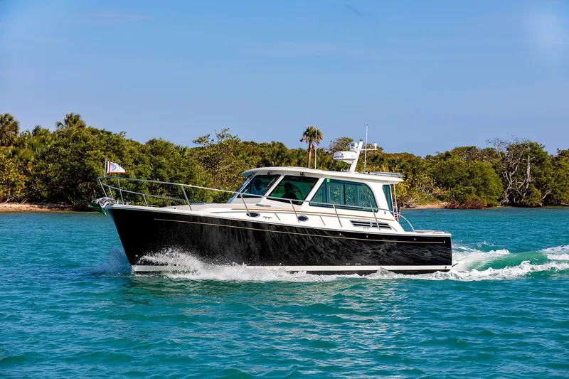 Slide: The Image of 2025 Back Cove 372 cruising on a sunny day. - 6