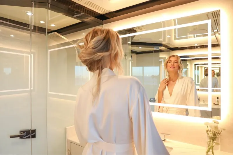 Slide: The Image of Luxurious bathroom on the 2023 Ocean Alexander 37L yacht with elegant lighting and modern design. - 14