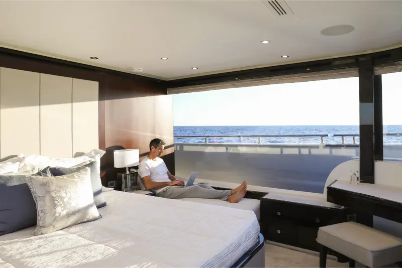 Slide: The Image of Luxurious bedroom on 2023 Ocean Alexander 37L yacht with ocean view. - 17