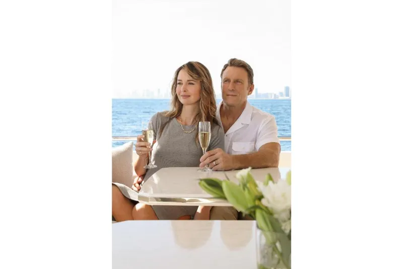 Slide: The Image of Couple enjoying champagne on Ocean Alexander 37L yacht, 2023 model. - 25