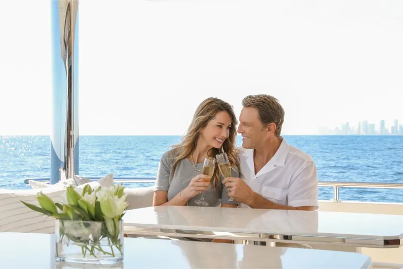 Slide: The Image of Couple enjoying champagne on Ocean Alexander 37L yacht, 2023 model. - 26