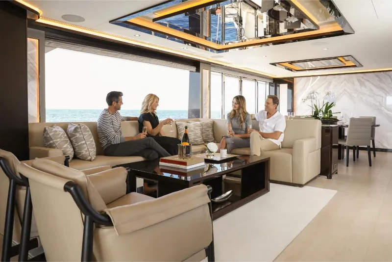 Slide: The Image of Luxurious interior of 2023 Ocean Alexander 37L yacht with people socializing. - 27