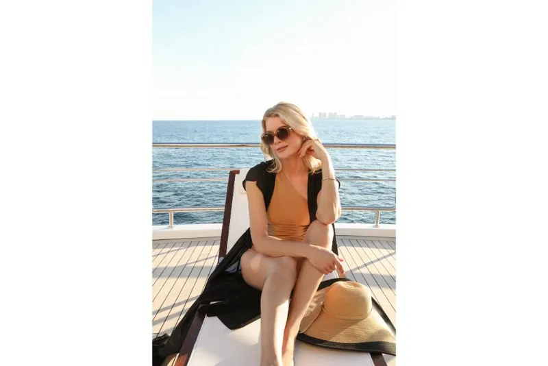 Slide: The Image of Woman relaxing on Ocean Alexander 37L yacht, 2023 model, with ocean view. - 40