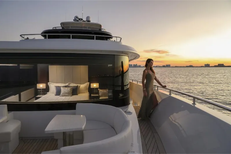Slide: The Image of Luxury Ocean Alexander 37L yacht at sunset with a woman on deck, 2023 model. - 44