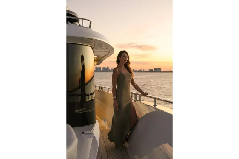 Slide: The Image of Woman in elegant dress on Ocean Alexander 37L yacht at sunset, 2023 model. - 45