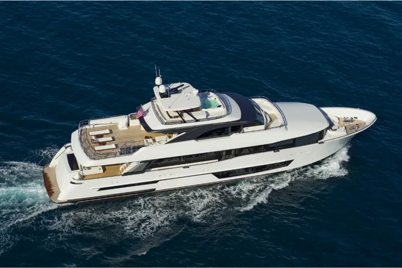 Slide: The Image of Aerial view of 2023 Ocean Alexander 37L luxury yacht cruising on the ocean. - 5