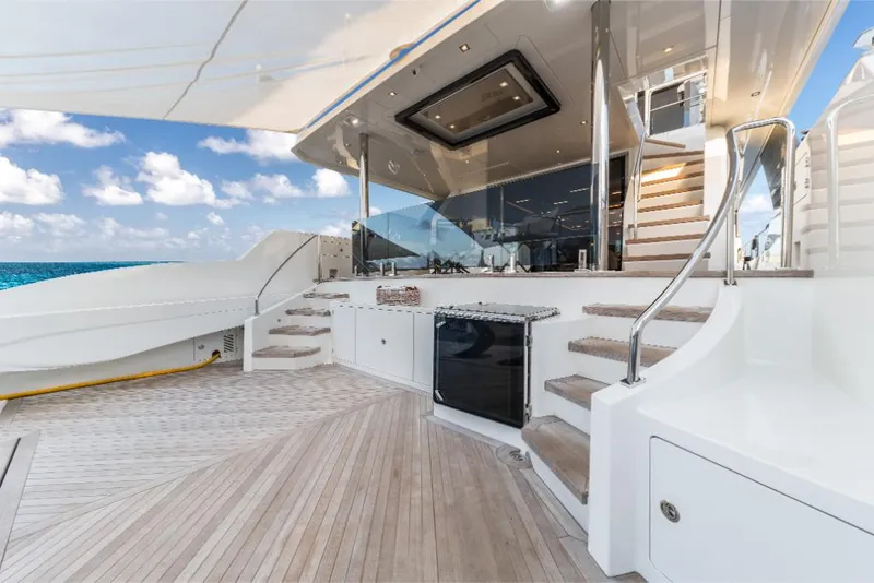 Slide: The Image of Luxury 2023 Ocean Alexander 27E yacht deck with modern amenities and ocean view. - 22