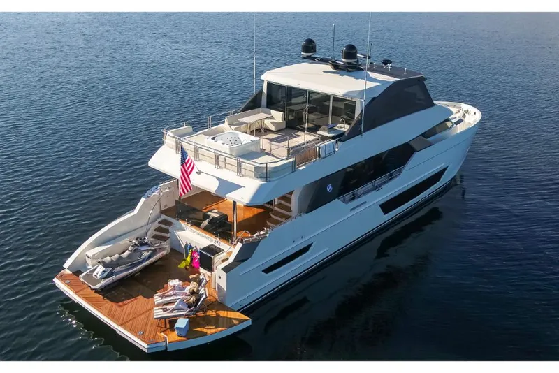 Slide: The Image of 2023 Ocean Alexander 27E luxury yacht on open water. - 3