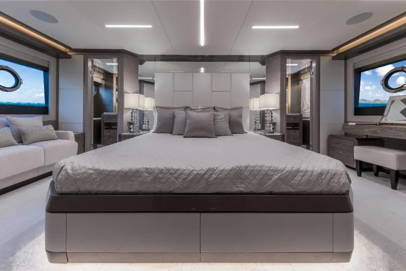 Slide: The Image of Luxurious master bedroom on the 2023 Ocean Alexander 27E yacht with modern decor. - 31