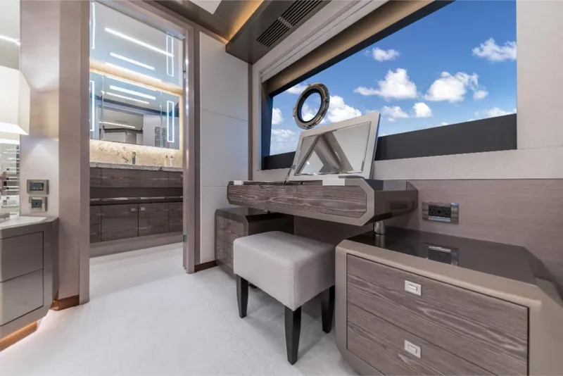 Slide: The Image of Luxurious vanity area on the 2023 Ocean Alexander 27E yacht with ocean view. - 32