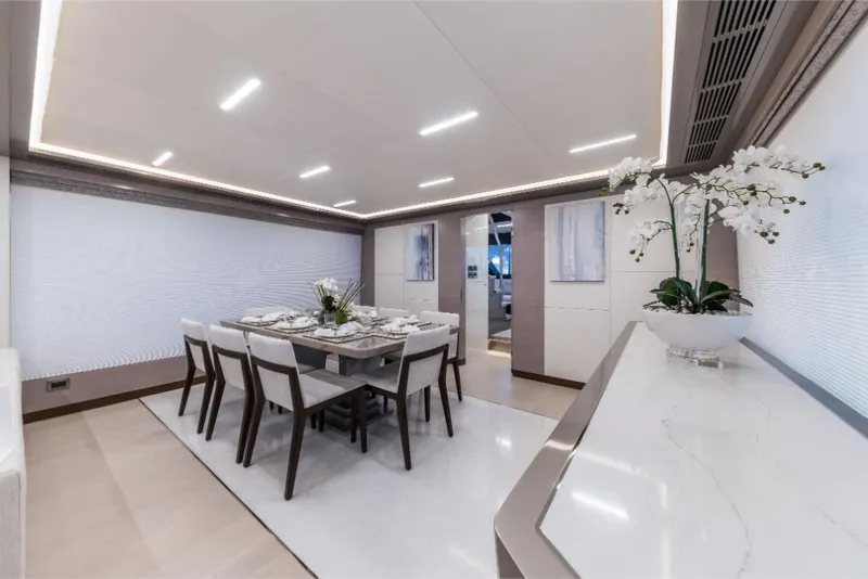 Slide: The Image of Luxurious dining area on the 2023 Ocean Alexander 27E yacht, featuring modern decor and elegant furnishings. - 35