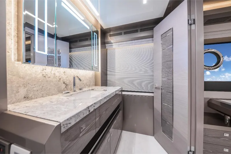 Slide: The Image of Luxurious bathroom interior of 2023 Ocean Alexander 27E yacht with modern fixtures and ocean view. - 45