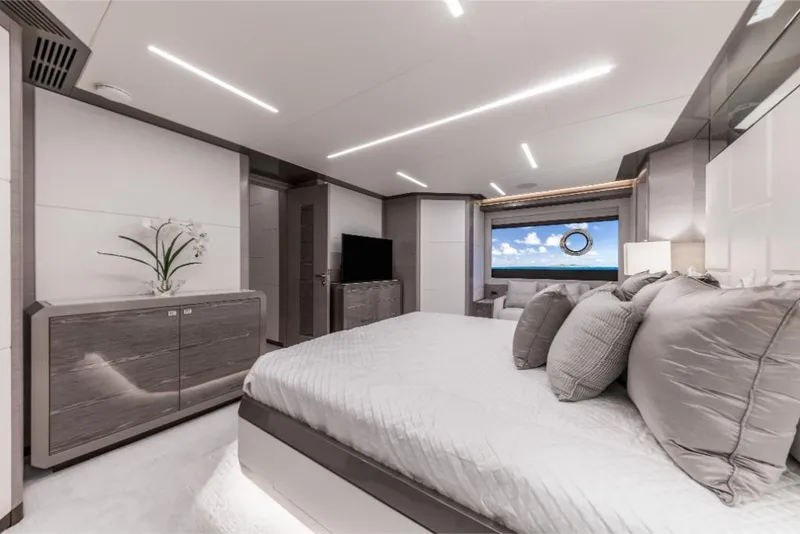 Slide: The Image of Luxurious bedroom interior of 2023 Ocean Alexander 27E yacht with modern decor and ocean view. - 47