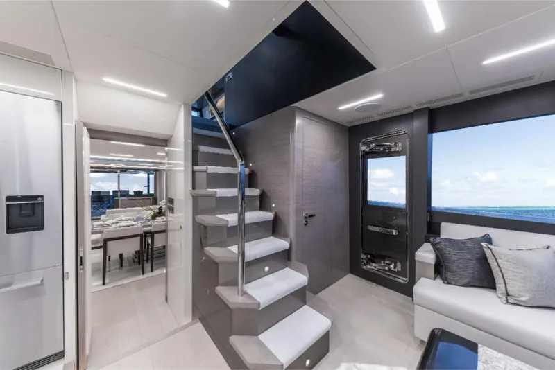 Slide: The Image of Modern interior of 2023 Ocean Alexander 27E yacht with staircase and ocean view. - 49