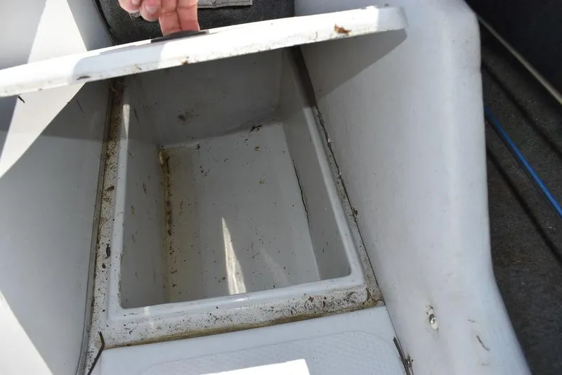 Slide: The Image of Open storage compartment on a 1991 Sea Sprite 225 boat. - 17