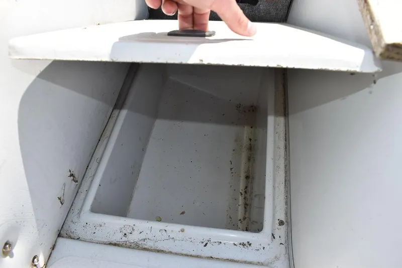 Slide: The Image of Storage compartment of a 1991 Sea Sprite 225 boat. - 18